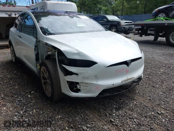 ✅ 2020 Tesla Model X Long Range • VIN: 5YJXCBE23LF263830 • Lot: 42956237. Listed on IAAI with 73,741 mi. Free auction sales archive from the USA and detailed vehicle history report at DreamBid. Image 1.