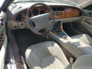 ✅ 1998 Jaguar XK • VIN: SAJGX2241WC025200 • Lot: 67867325. Listed on Copart with 55,803 mi. Free auction sales archive from the USA and detailed vehicle history report at DreamBid. Image 8.