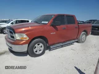 2009 Dodge 1500 SLT with VIN 1D3HB13P99S738089, listed as a Copart auction lot 82688525 with 261,186 mi miles and Salvage title. Bid and sale history available at DreamBid. Image 1.