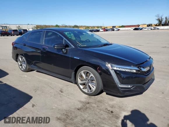 ✅ 2018 Honda Clarity • VIN: JHMZC5F1XJC011632 • Lot: 71693242. Listed on Copart with 137,475 mi. Free auction sales archive from the USA and detailed vehicle history report at DreamBid. Image 4.