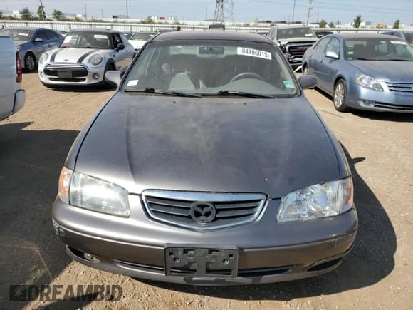 ✅ 2001 Mazda 626 LX • VIN: 1YVGF22C715200453 • Lot: 84706015. Wystawiony na Copart z przebiegiem 63 514 mil. Bezpłatny archiwum sprzedaży aukcyjnych z USA i szczegółowy raport historii pojazdu na DreamBid. Zdjęcie 5.