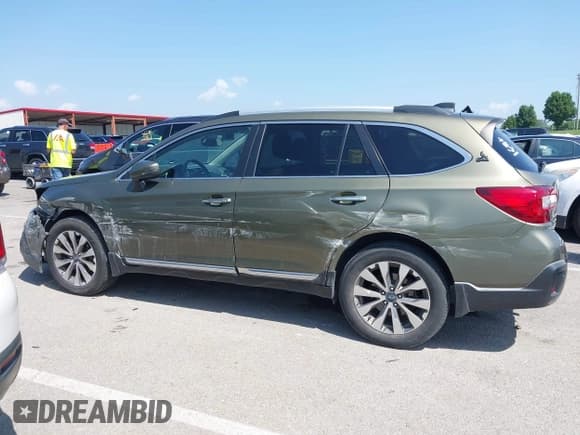 ✅ 2019 Subaru Outback Touring • VIN: 4S4BSETC2K3346215 • Лот: 42787712. Опубликован ранее на IAAI с пробегом 143 388 миль. Бесплатный доступ к архиву аукционных продаж из США и подробный отчёт об истории автомобиля на DreamBid. Изображение 14.