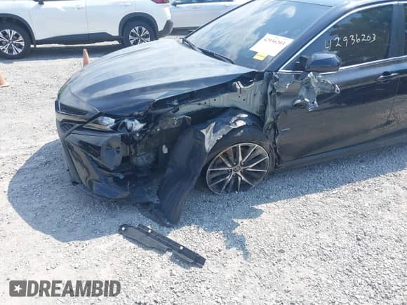 2022 Toyota Camry SE with VIN 4T1G11BK1NU053821, listed as a IAAI auction lot 42936203 with 41,547 mi miles and . Bid and sale history available at DreamBid. Image 6.