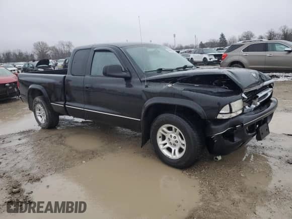 2004 Dodge Dakota Sport z VIN 1D7GL32N34S708694, wystawiony jako Copart lot #85050064 z przebiegiem Nie podano mil oraz Szkoda całkowita • Salvage title. Historia ofert i sprzedaży dostępna na DreamBid. Obrazek 4.