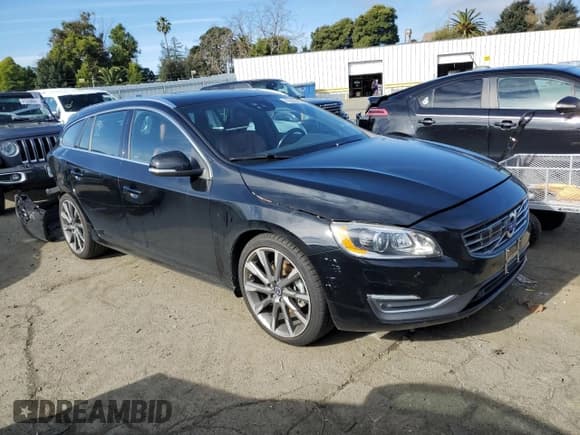 ✅ 2015 Volvo V60 T5 Drive-E Platinum • VIN: YV140MEM5F1231963 • Лот: 42265744. Опубликован ранее на Copart с пробегом 102 864 миль. Бесплатный доступ к архиву аукционных продаж из США и подробный отчёт об истории автомобиля на DreamBid. Изображение 4.