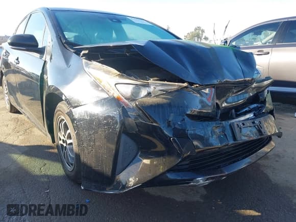 ✅ 2017 Toyota Prius Two • VIN: JTDKBRFU7H3035565 • Lot: 43656486. Listed on IAAI with 152,690 mi. Free auction sales archive from the USA and detailed vehicle history report at DreamBid. Image 17.