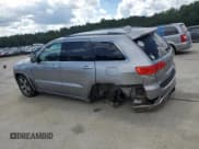 ✅ 2014 Jeep Grand Cherokee Overland • VIN: 1C4RJFCG5EC210163 • Lot: 68894775. Listed on Copart with 205,339 mi. Free auction sales archive from the USA and detailed vehicle history report at DreamBid. Image 2.