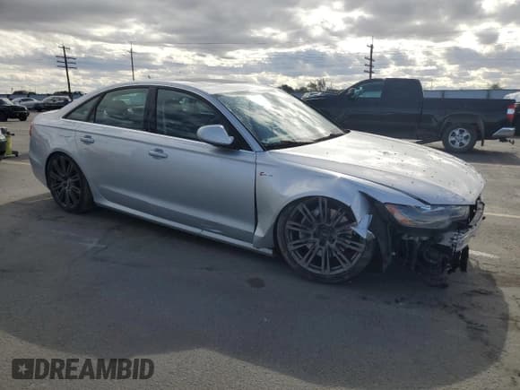 ✅ 2012 Audi A6 Prestige • VIN: WAUJGAFC5CN121618 • Лот: 84836245. Опубликован ранее на Copart с пробегом 94 249 миль. Бесплатный доступ к архиву аукционных продаж из США и подробный отчёт об истории автомобиля на DreamBid. Изображение 4.