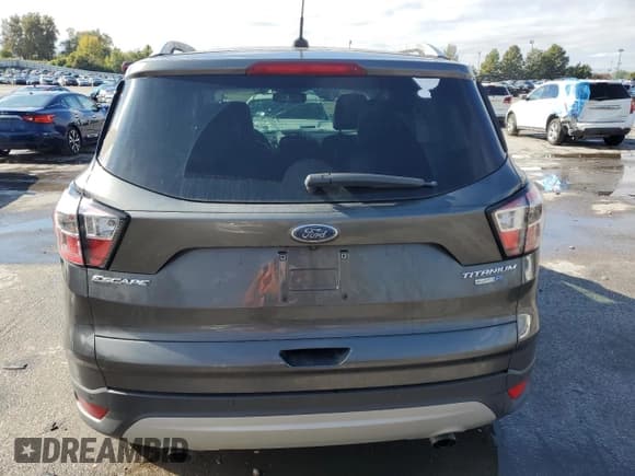 ✅ 2017 Ford Escape Titanium • VIN: 1FMCU9J90HUD60369 • Лот: 89916385. Опубликован ранее на Copart с пробегом 112 643 миль. Бесплатный доступ к архиву аукционных продаж из США и подробный отчёт об истории автомобиля на DreamBid. Изображение 6.