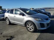 ✅ 2010 Mazda CX-7 Touring • VIN: JM3ER4WLXA0306569 • Лот: 90509355. Опубликован ранее на Copart с пробегом 143 972 миль. Бесплатный доступ к архиву аукционных продаж из США и подробный отчёт об истории автомобиля на DreamBid. Изображение 4.