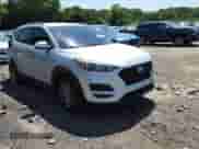 2019 Hyundai Tucson Value with VIN KM8J3CA47KU014032, listed as a Copart auction lot 63592985 with 62,040 mi miles and Salvage title. Bid and sale history available at DreamBid. Image 14.