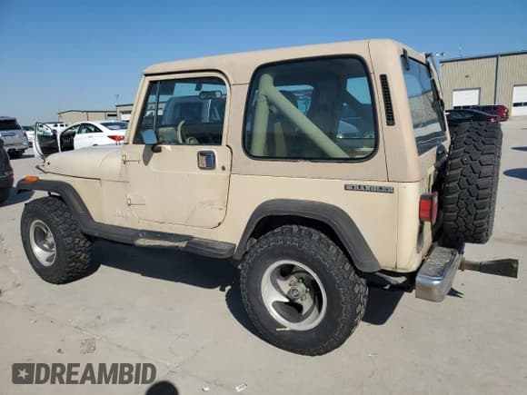 ✅ 1990 Jeep Wrangler S • VIN: 2J4FY19E1LJ514613 • Lot: 88659635. Wystawiony na Copart z przebiegiem 160 071 mil. Bezpłatny archiwum sprzedaży aukcyjnych z USA i szczegółowy raport historii pojazdu na DreamBid. Zdjęcie 2.