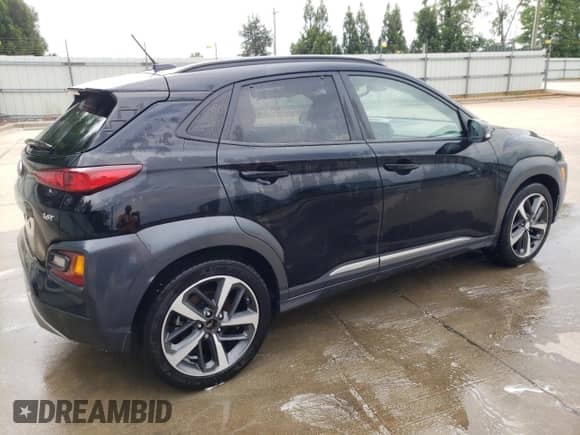 2018 Hyundai Kona Ultimate with VIN KM8K53A5XJU094450, listed as a Copart auction lot 57766165 with 104,797 mi miles and Clean title. Bid and sale history available at DreamBid. Image 3.