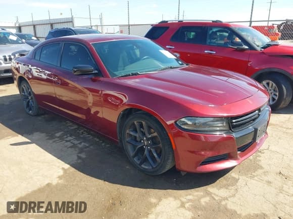 ✅ 2020 Dodge Charger SXT • VIN: 2C3CDXBG9LH232363 • Lot: 43361519. Listed on IAAI with 113,375 mi. Free auction sales archive from the USA and detailed vehicle history report at DreamBid. Image 1.