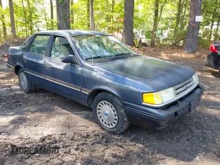 ✅ 1990 Ford Tempo • VIN: 1FAPP36X7LK127424 • Lot: 42101881. Wystawiony na IAAI z przebiegiem 70 846 mil. Bezpłatny archiwum sprzedaży aukcyjnych z USA i szczegółowy raport historii pojazdu na DreamBid. Zdjęcie 1.