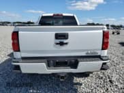 ✅ 2015 Chevrolet Silverado 2500HD High Country • VIN: 1GC1KXE85FF677959 • Lot: 90101215. Listed on Copart with 146,383 mi. Free auction sales archive from the USA and detailed vehicle history report at DreamBid. Image 6.