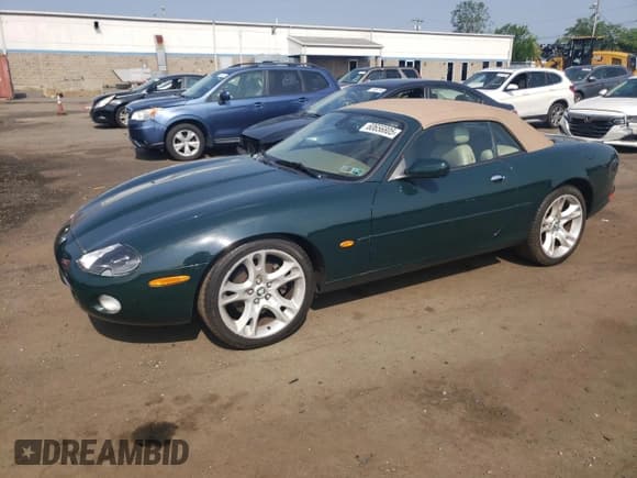 ✅ 2003 Jaguar XK • VIN: SAJDA42C532A36020 • Lot: 60656805. Wystawiony na Copart z przebiegiem 65 020 mil. Bezpłatny archiwum sprzedaży aukcyjnych z USA i szczegółowy raport historii pojazdu na DreamBid. Zdjęcie 1.