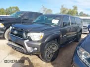 ✅ 2015 Toyota Tacoma • VIN: 5TFLU4EN8FX119895 • Lot: 43670596. Listed on IAAI with 185,866 mi. Free auction sales archive from the USA and detailed vehicle history report at DreamBid. Image 2.