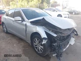 ✅ 2014 Infiniti Q50 Premium • VIN: JN1BV7AP7EM679489 • Lot: 43679706. Listed on IAAI with 153,839 mi. Free auction sales archive from the USA and detailed vehicle history report at DreamBid. Image 1.