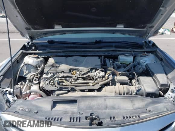 2021 Toyota Camry Hybrid SE z VIN 4T1G31AKXMU562641, wystawiony jako IAAI lot #42415712 z przebiegiem 71 085 mil mil oraz . Historia ofert i sprzedaży dostępna na DreamBid. Obrazek 10.