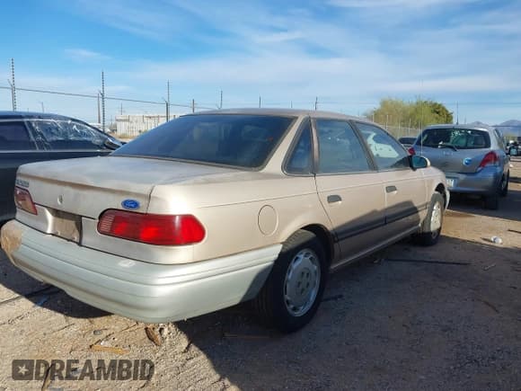 ✅ 1992 Ford Taurus GL • VIN: 1FALP52U4NG183123 • Lot: 41731014. Listed on IAAI with 98,323 mi. Free auction sales archive from the USA and detailed vehicle history report at DreamBid. Image 4.