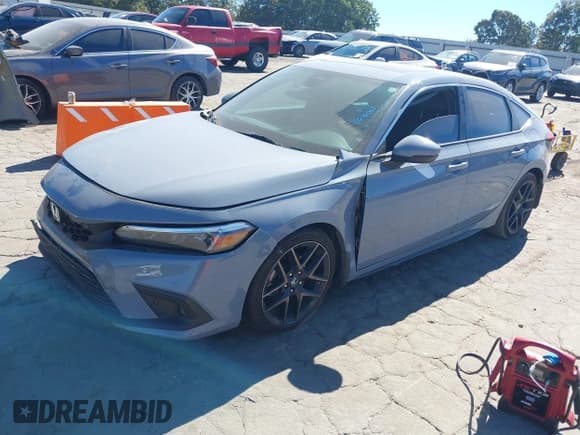 ✅ 2022 Honda Civic Sport Touring • VIN: 19XFL1H87NE016003 • Лот: 43446993. Опубликован ранее на IAAI с пробегом 112 691 миль. Бесплатный доступ к архиву аукционных продаж из США и подробный отчёт об истории автомобиля на DreamBid. Изображение 17.