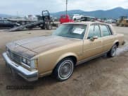 ✅ 1985 Oldsmobile Cutlass Supreme • VIN: 1G3GM69Y7FR413133 • Лот: 42431279. Опубликован ранее на IAAI с пробегом 83 890 миль. Бесплатный доступ к архиву аукционных продаж из США и подробный отчёт об истории автомобиля на DreamBid. Изображение 2.