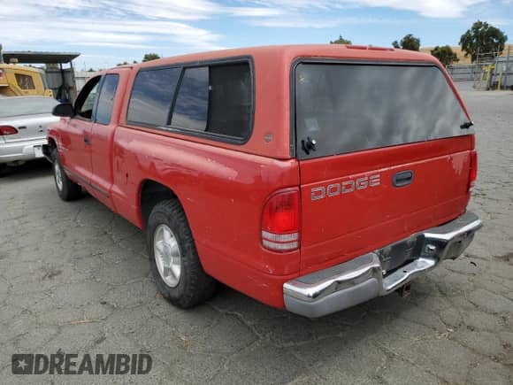 1997 Dodge Dakota z VIN 1B7GL23XXVS265918, wystawiony jako Copart lot #66989384 z przebiegiem 197 880 mil mil oraz Szkoda całkowita • Salvage title. Historia ofert i sprzedaży dostępna na DreamBid. Obrazek 2.