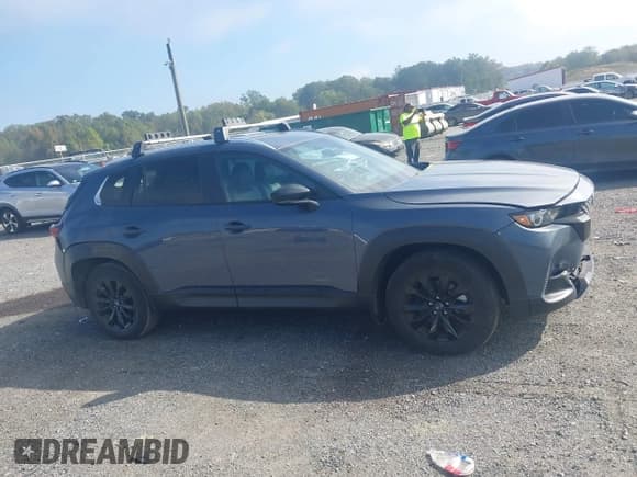 ✅ 2024 Mazda CX-50 S Preferred • VIN: 7MMVABBM1RN213702 • Lot: 43359850. Listed on IAAI with 34,042 mi. Free auction sales archive from the USA and detailed vehicle history report at DreamBid. Image 13.