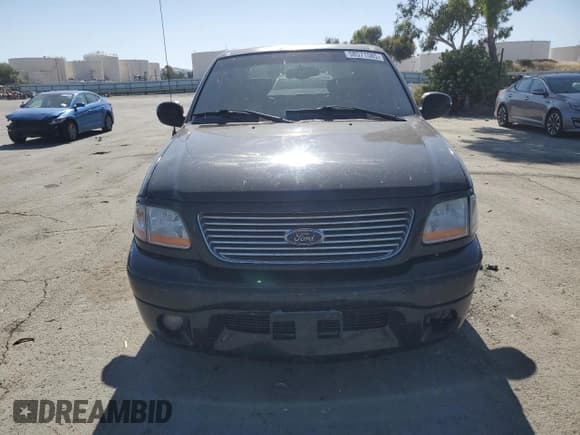 ✅ 2003 Ford F-150 Harley-Davidson • VIN: 1FTRW07373KC44985 • Lot: 58571585. Listed on Copart with 202,249 mi. Free auction sales archive from the USA and detailed vehicle history report at DreamBid. Image 5.