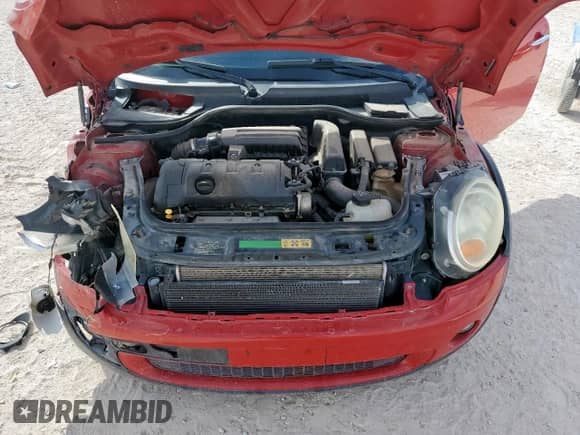 2009 MINI Hardtop z VIN WMWMF33539TW70482, wystawiony jako Copart lot #86130595 z przebiegiem 120 031 mil mil oraz Szkoda całkowita • Salvage title. Historia ofert i sprzedaży dostępna na DreamBid. Obrazek 11.