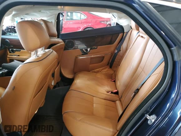 ✅ 2014 Jaguar XJ Portfolio • VIN: SAJWJ2GD1E8V61328 • Лот: 64867705. Опубликован ранее на Copart с пробегом 78 024 миль. Бесплатный доступ к архиву аукционных продаж из США и подробный отчёт об истории автомобиля на DreamBid. Изображение 10.