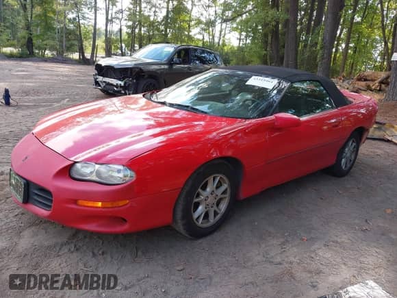 2002 Chevrolet Camaro z VIN 2G1FP32K522138620, wystawiony jako IAAI lot #43319461 z przebiegiem 143 190 mil mil oraz . Historia ofert i sprzedaży dostępna na DreamBid. Obrazek 17.