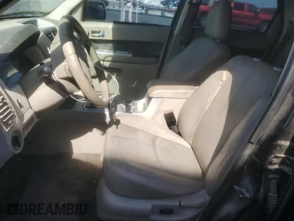 ✅ 2010 Mercury Mariner Premier • VIN: 4M2CN8H73AKJ06652 • Lot: 61690555. Listed on Copart with 202,434 mi. Free auction sales archive from the USA and detailed vehicle history report at DreamBid. Image 7.