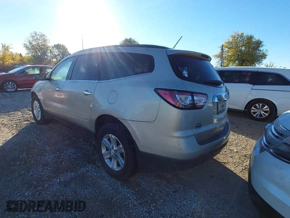 ✅ 2014 Chevrolet Traverse LT • VIN: 1GNKRHKD0EJ113596 • Lot: 43534806. Listed on IAAI with 137,655 mi. Free auction sales archive from the USA and detailed vehicle history report at DreamBid. Image 3.