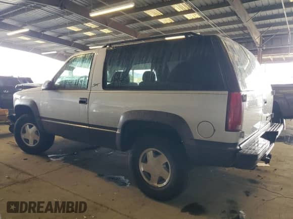 1996 Chevrolet Tahoe с VIN 3GNEK18R8TG153886, выставлен на аукционе Copart как лот 82260705 с пробегом 126 142 миль миль и Списание • Salvage title. История ставок и продаж доступна на DreamBid. Изображение 2.