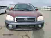 2002 Hyundai Santa Fe GLS z VIN KM8SC13D02U173092, wystawiony jako Copart lot #87683115 z przebiegiem 96 950 mil mil oraz Szkoda całkowita • Salvage title. Historia ofert i sprzedaży dostępna na DreamBid. Obrazek 5.
