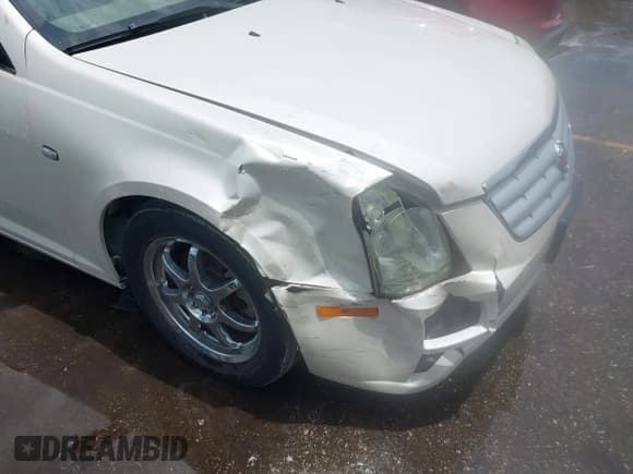 ✅ 2005 Cadillac STS • VIN: 1G6DW677150232297 • Lot: 42471215. Listed on IAAI with 87,715 mi. Free auction sales archive from the USA and detailed vehicle history report at DreamBid. Image 6.