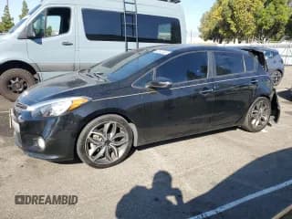 ✅ 2015 Kia Forte SX • VIN: KNAFZ5A37F5269076 • Лот: 84945305. Опубликован ранее на Copart с пробегом 102 011 миль. Бесплатный доступ к архиву аукционных продаж из США и подробный отчёт об истории автомобиля на DreamBid. Изображение 1.