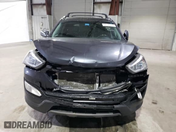 ✅ 2016 Hyundai Santa Fe • VIN: 5XYZWDLA3GG324484 • Лот: 38178744. Опубликован ранее на Copart с пробегом 70 116 миль. Бесплатный доступ к архиву аукционных продаж из США и подробный отчёт об истории автомобиля на DreamBid. Изображение 5.