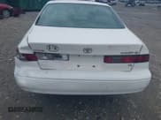 ✅ 1999 Toyota Camry LE • VIN: JT2BF28K2X0224866 • Lot: 42628222. Wystawiony na IAAI z przebiegiem 304 759 mil. Bezpłatny archiwum sprzedaży aukcyjnych z USA i szczegółowy raport historii pojazdu na DreamBid. Zdjęcie 6.