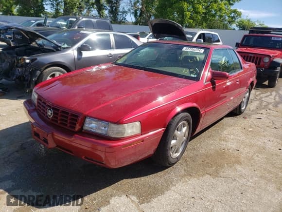 ✅ 2000 Cadillac Eldorado Touring ETC • VIN: 1G6ET129XYU191433 • Lot: 58108224. Listed on Copart with 76,957 mi. Free auction sales archive from the USA and detailed vehicle history report at DreamBid. Image 1.