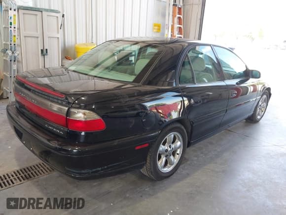 ✅ 1997 Cadillac Catera • VIN: W06VR54R9VR162389 • Lot: 40142990. Listed on IAAI with 111,558 mi. Free auction sales archive from the USA and detailed vehicle history report at DreamBid. Image 4.