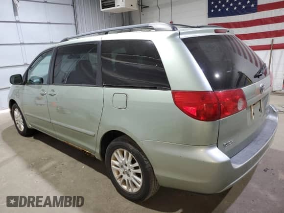 2009 Toyota Sienna LE with VIN 5TDBK23CX9S027351, listed as a Copart auction lot 68439665 with 151,844 mi miles and Clean title. Bid and sale history available at DreamBid. Image 2.