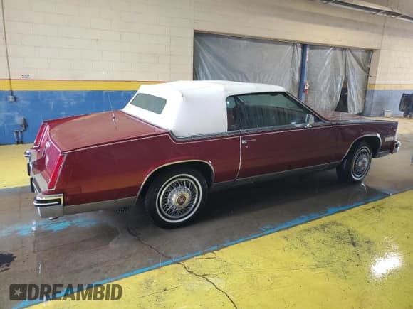 ✅ 1984 Cadillac Eldorado Biarritz • VIN: 1G6AL6784EE616257 • Lot: 81231054. Wystawiony na Copart z przebiegiem 82 109 mil. Bezpłatny archiwum sprzedaży aukcyjnych z USA i szczegółowy raport historii pojazdu na DreamBid. Zdjęcie 3.
