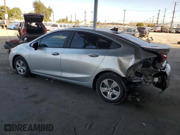 ✅ 2018 Chevrolet Cruze LS • VIN: 1G1BC5SM7J7134731 • Lot: 82364625. Listed on Copart with 84,754 mi. Free auction sales archive from the USA and detailed vehicle history report at DreamBid. Image 2.