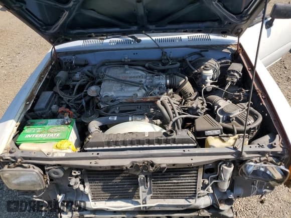 ✅ 1989 Toyota Pickup • VIN: JT4VN82N8K5000381 • Лот: 70530034. Опубликован ранее на Copart с пробегом 242 001 миль. Бесплатный доступ к архиву аукционных продаж из США и подробный отчёт об истории автомобиля на DreamBid. Изображение 11.