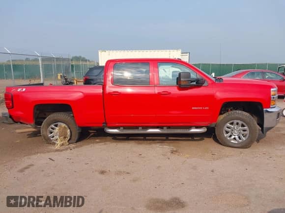 2019 Chevrolet Silverado 2500HD LT with VIN 1GC1KSEG1KF273433, listed as a IAAI auction lot 42853442 with 141,104 mi miles and . Bid and sale history available at DreamBid. Image 13.