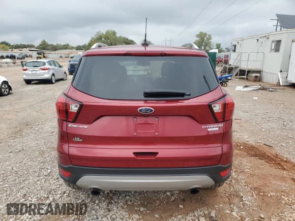✅ 2019 Ford Escape Titanium • VIN: 1FMCU0J98KUB00644 • Lot: 89912215. Wystawiony na Copart z przebiegiem 40 406 mil. Bezpłatny archiwum sprzedaży aukcyjnych z USA i szczegółowy raport historii pojazdu na DreamBid. Zdjęcie 6.