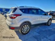 ✅ 2017 Ford Escape Titanium • VIN: 1FMCU0J98HUD10069 • Лот: 94386305. Опубликован ранее на Copart с пробегом 138 255 миль. Бесплатный доступ к архиву аукционных продаж из США и подробный отчёт об истории автомобиля на DreamBid. Изображение 3.